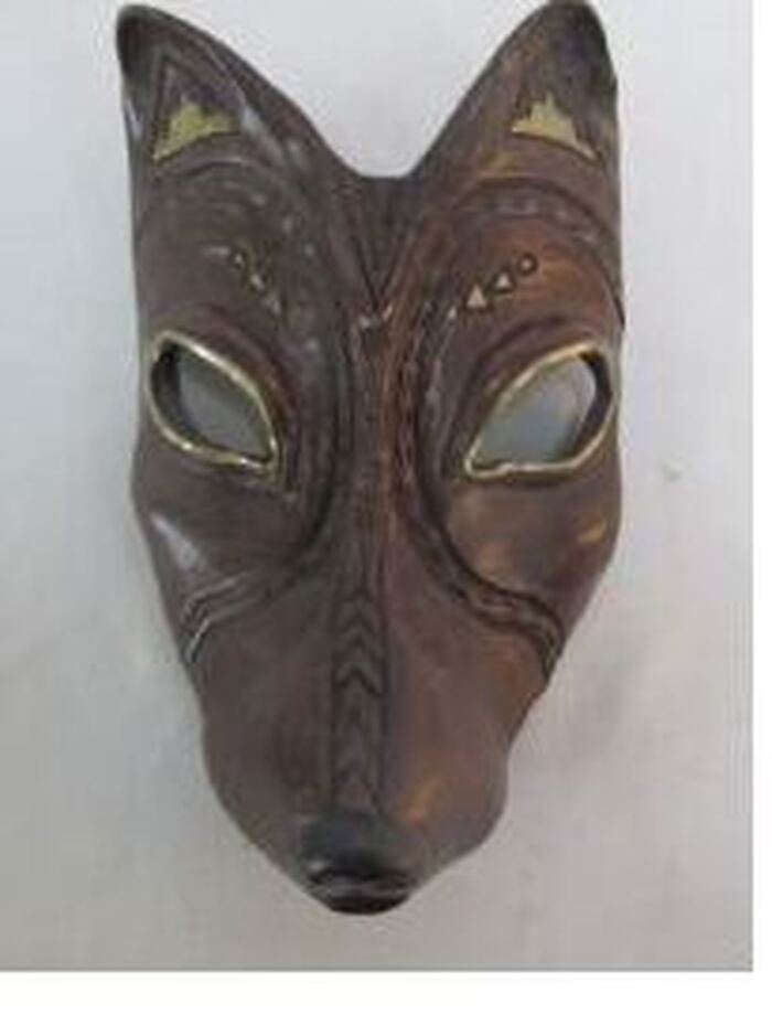 Carved Coyote mask by Lillian Pitt
