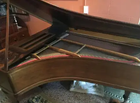 The piano's harp and soundboard, viewed from underneath