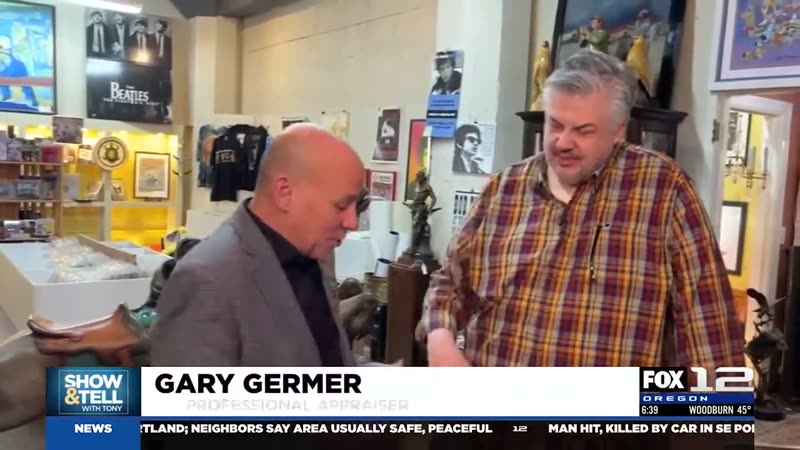 Gary Germer appraising items for Fox 12's Show and Tell with Tony